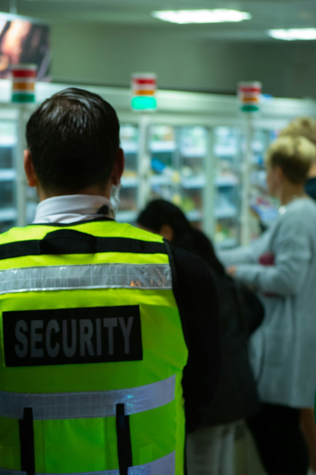 store detective observing customers