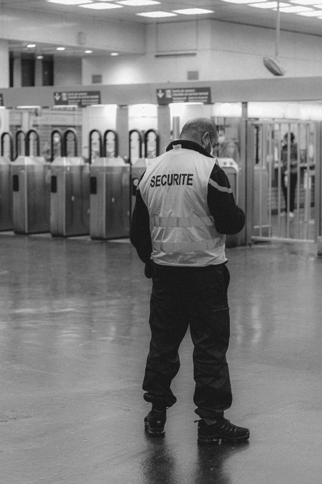 store detective watching customers